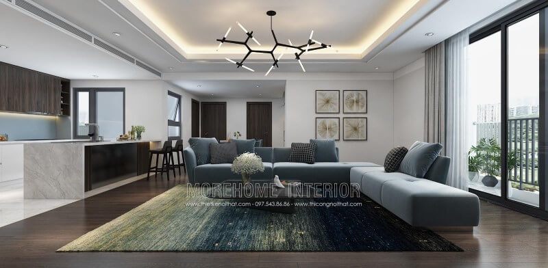 . Sofa L bọc bằng chất liệu nỉ màu xanh nhạt giúp tạo ra một cảm giác nhẹ nhàng và thoải mái cho không gian phòng khách.